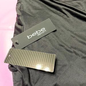 bebe sport t-shirt with animal print. NWT. 3X